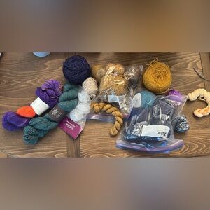 Assorted Yarn Collection in Blue, Gold, and Purple
